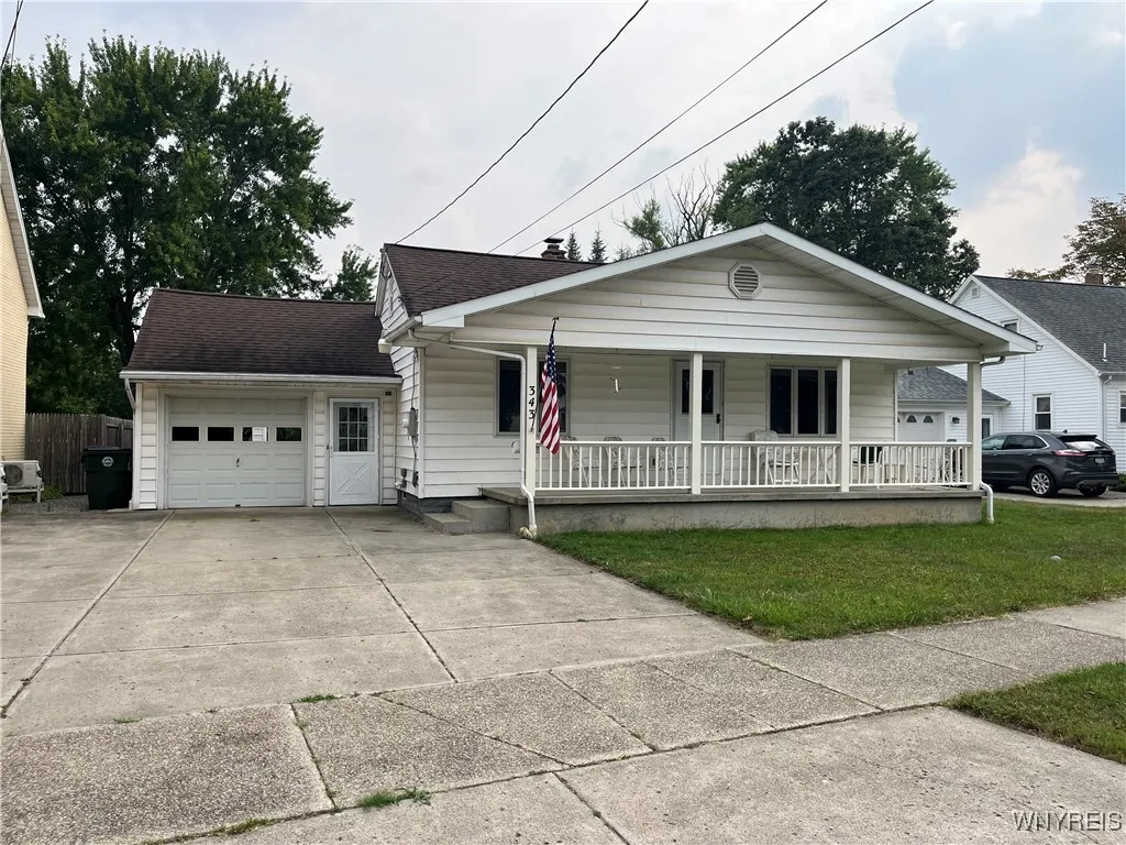 Plenty of parking! Extra wide concrete driveway
