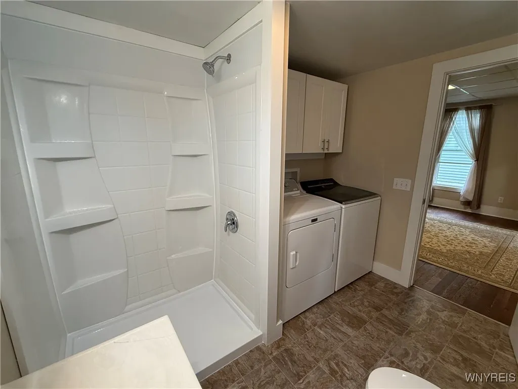 Remodeled bathroom with laundry