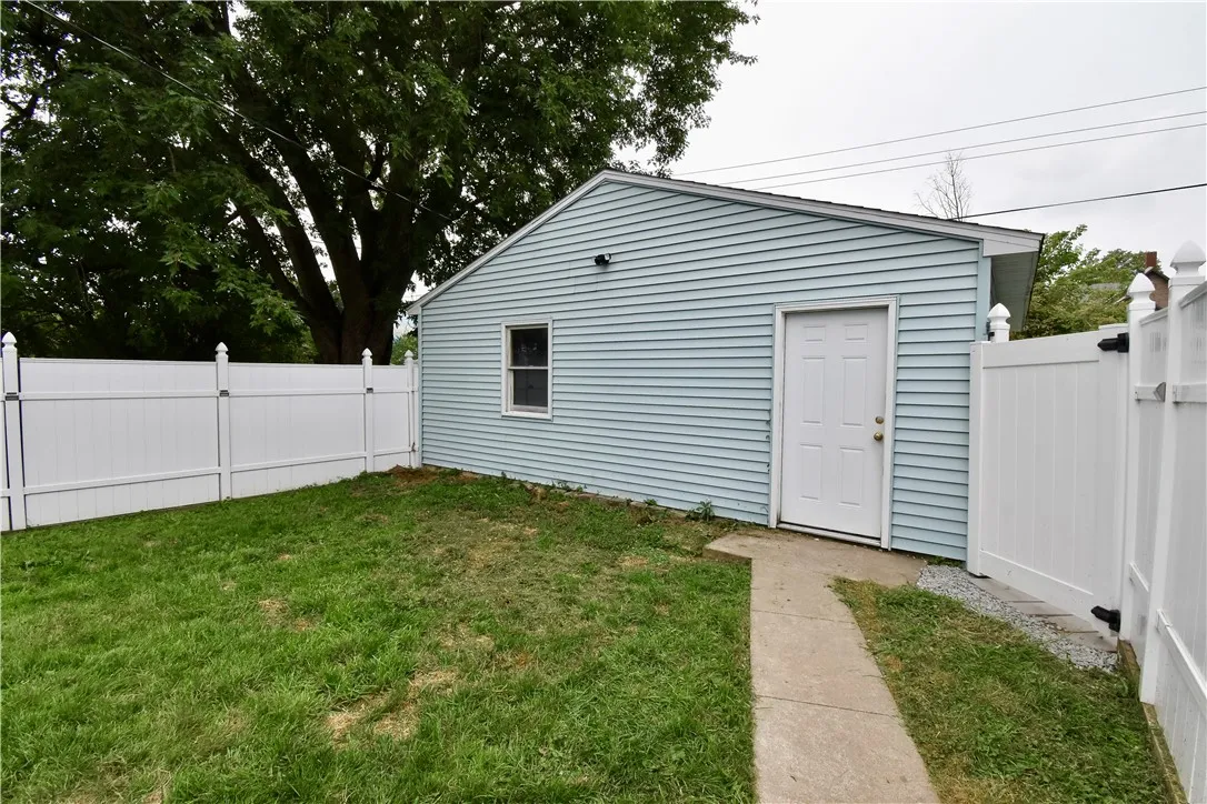 Path leads to the 2-car garage