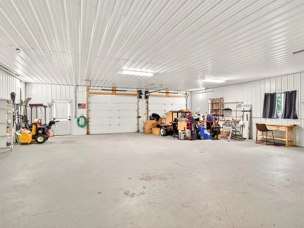 Garage, heated floors, will hold 5 cars, plus!