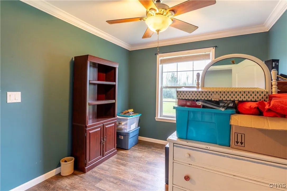 BEDROOM # 3,  FAIR SIZED WITH GOOD SIZED CLOSET.CROWN MOLDING EVERYWHERE!