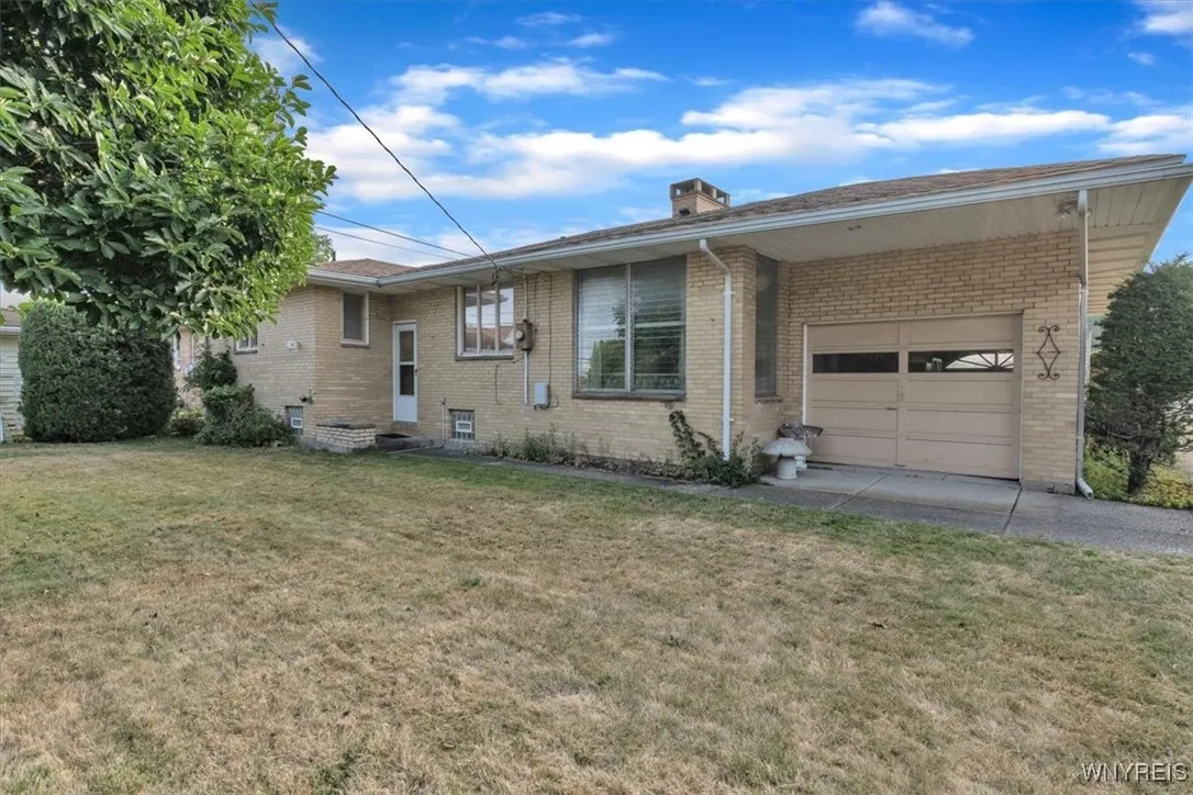 Check out the second garage door to the backyard.