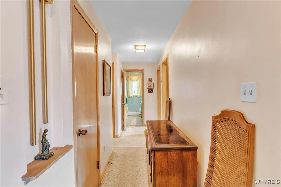 Enter into the first hallway to the bedroom area of the home