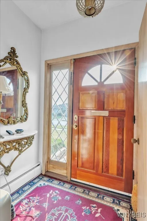 Welcoming entrance has plenty of room for greeting to guests.