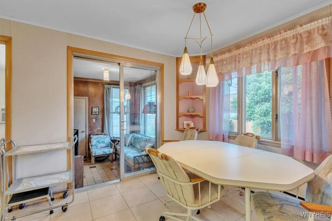 Catch a glimpse of the sunroom off the kitchen and dinning room