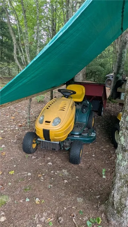 Riding lawn mower is included in sale