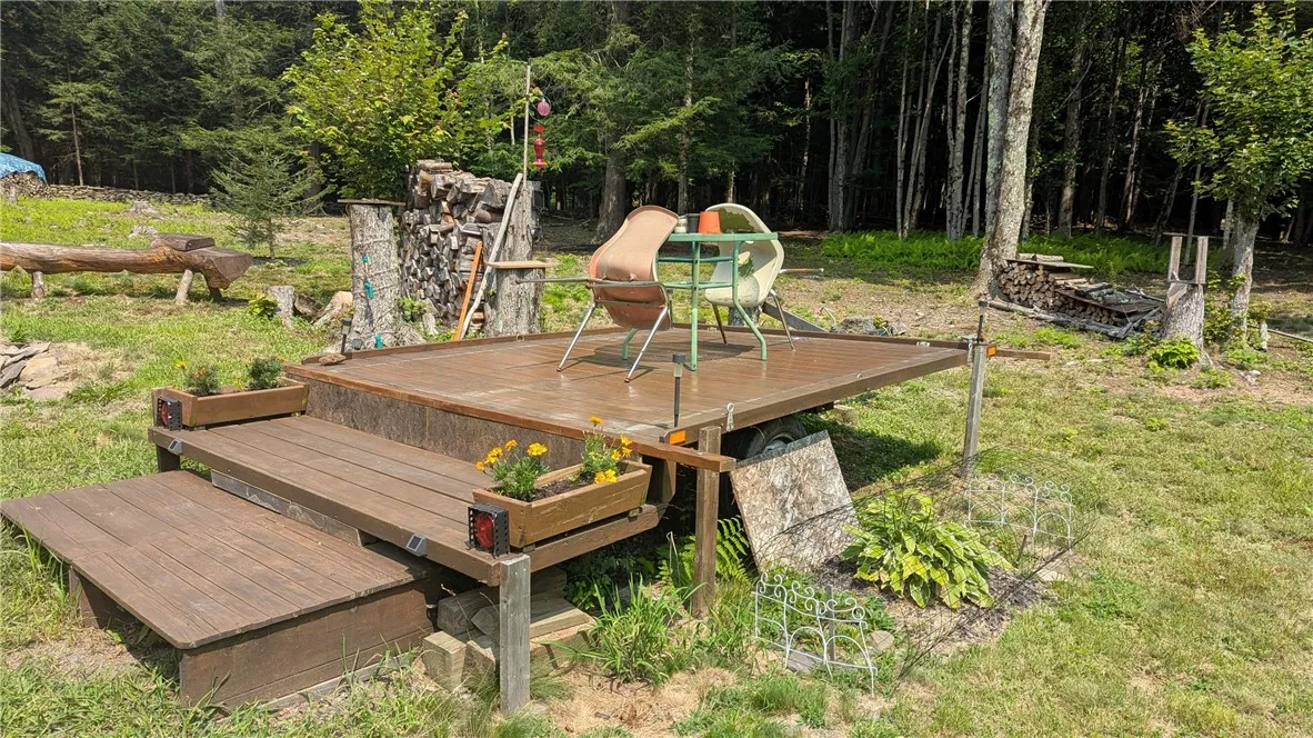 Deck is repurposed road worthy trailer