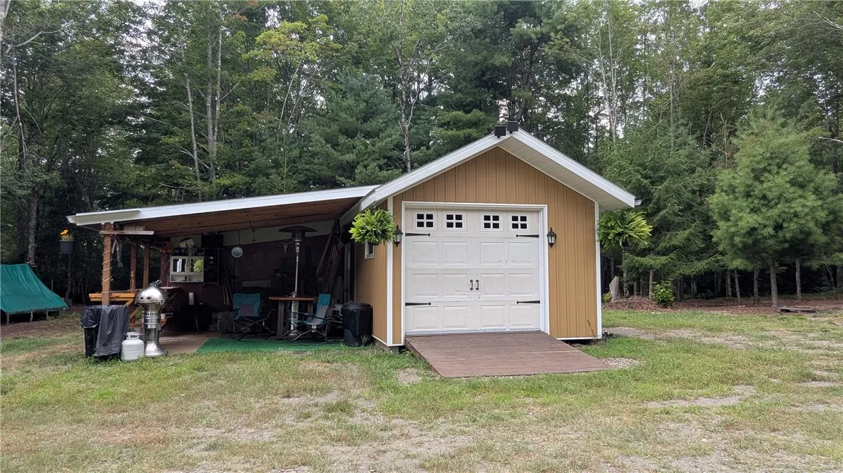 16 X 16 3 sided addition on 12 X 12 shed