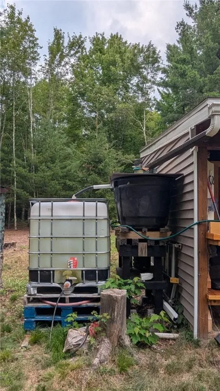 Clever rain collection system serves as water source for sink in 16X16 area