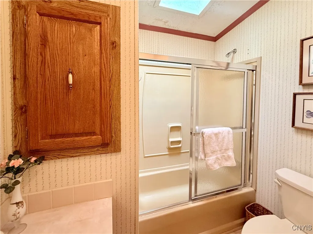 Guest bath located across from guest room