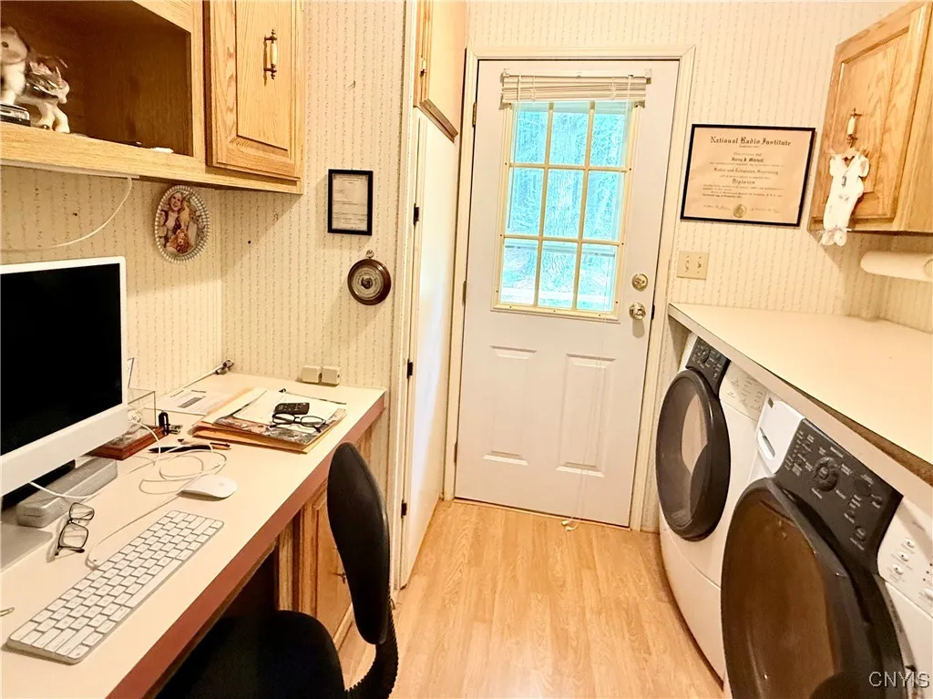office/laundry with exit. Would also make a great mudroom.