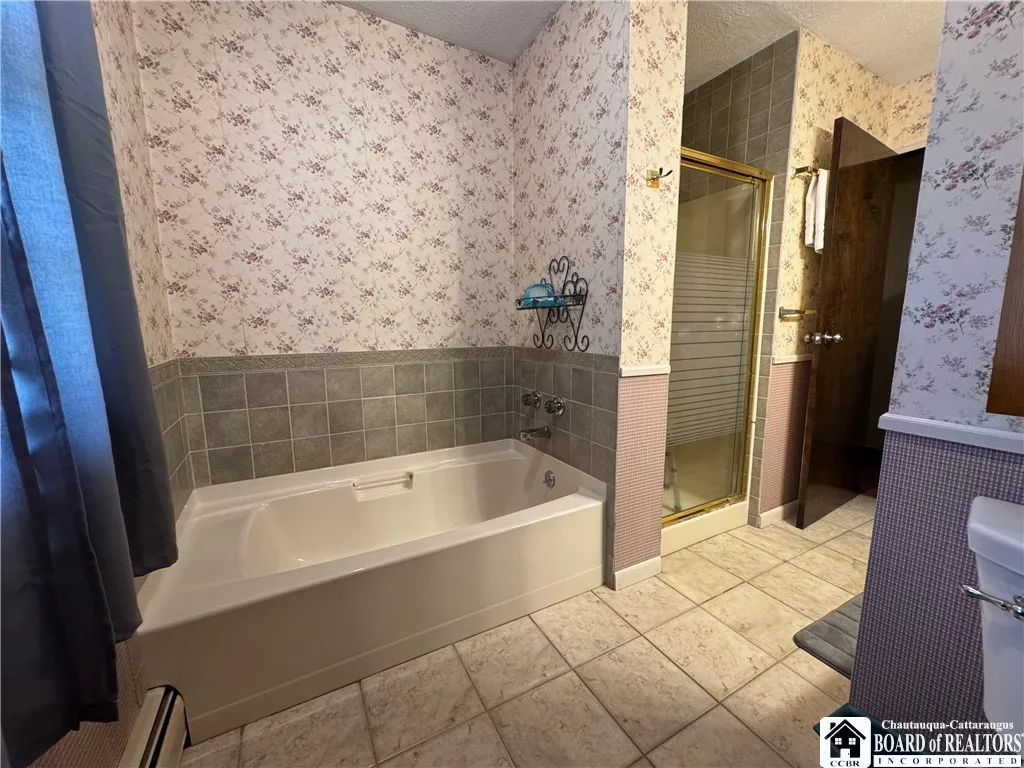 Tub with separate shower