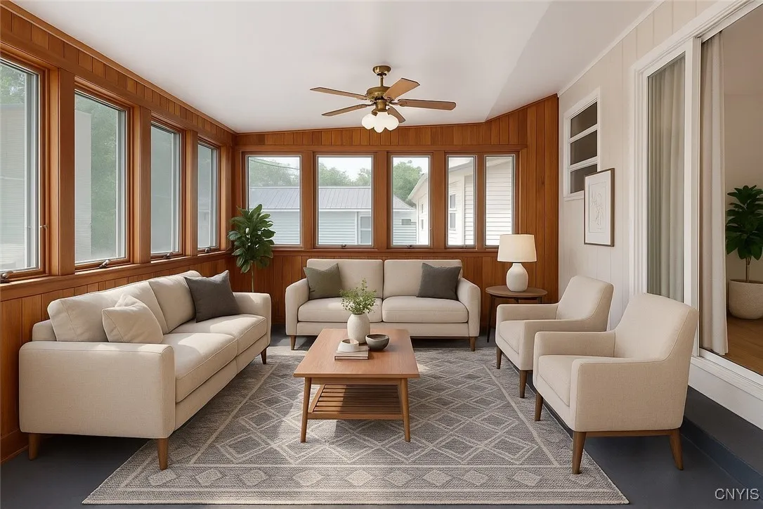 This photo of the sunporch has been virtually staged...WOW

