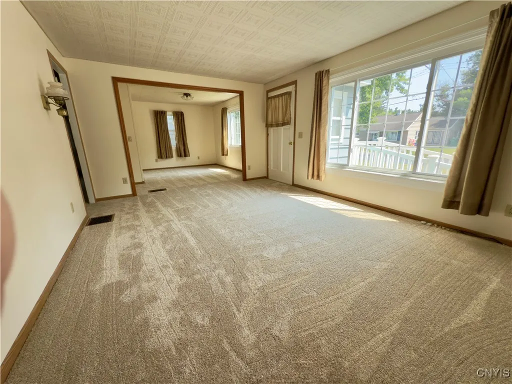 Living room open to potential 4th bedroom or den