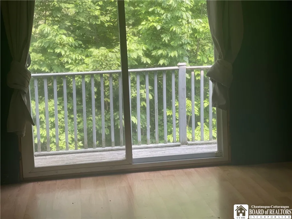 Back bedroom with deck off