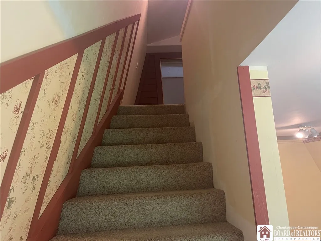 Stairs to bunk room - yes, the wall is slanted !