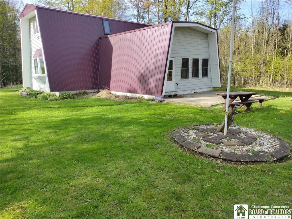 Kitchen end of house with patio