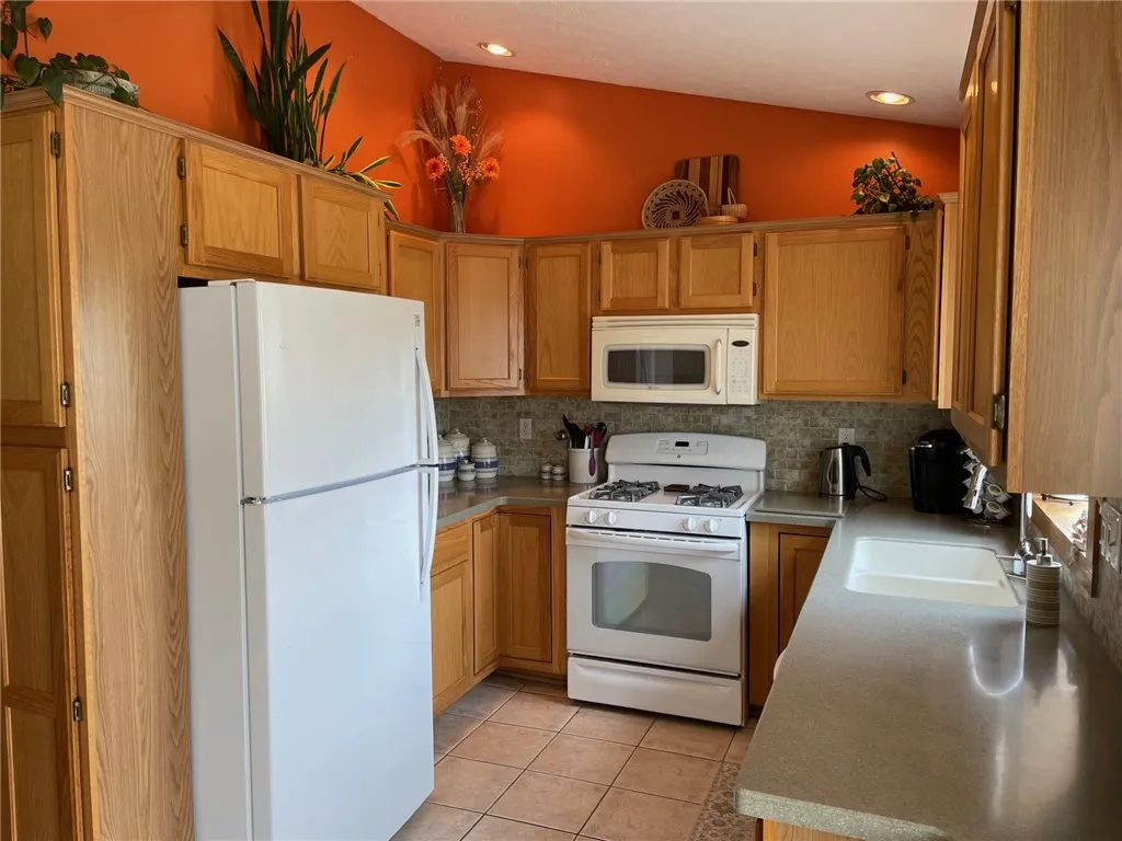 All kitchen appliances included, including gas stove