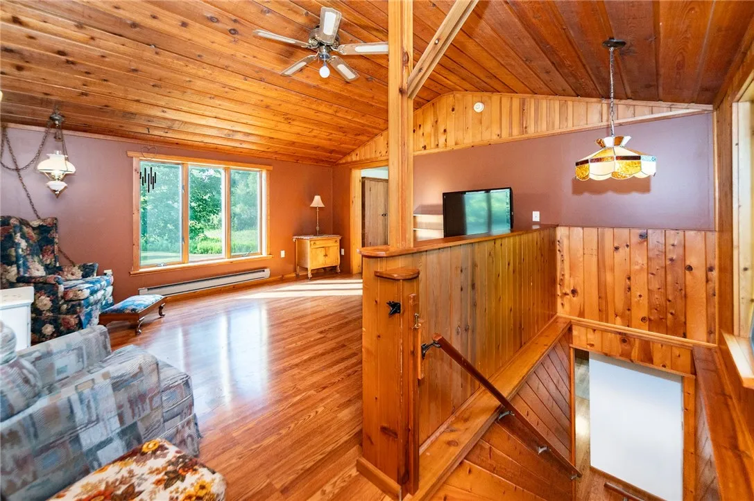 Living room, stairs to basement