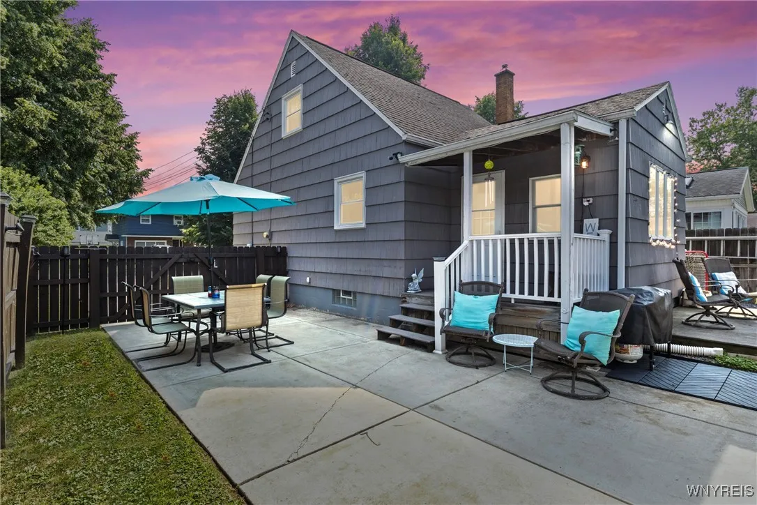 Back Patio & Covered Porch Area Perfect for Entertaining Right Off Of the Kitchen