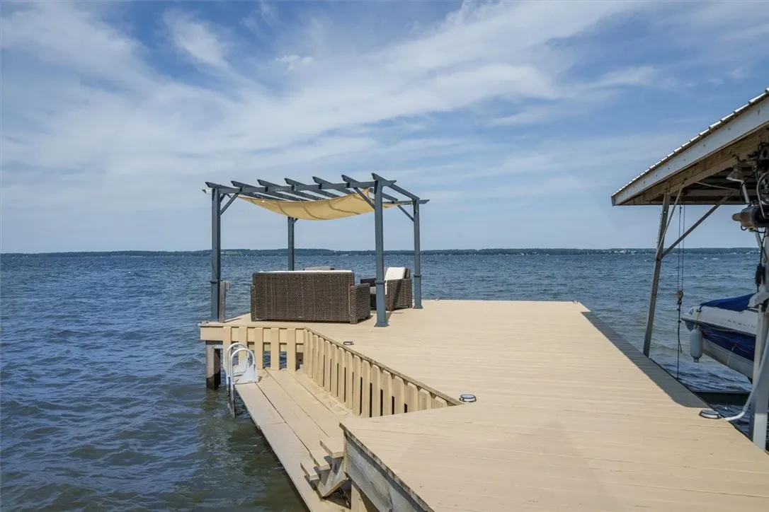 Dock has lowered sections for swimming off of.