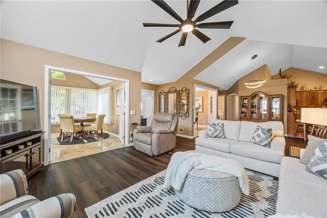 Living Room with 4 season room in rear view