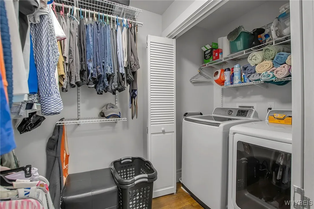 Primary closet with laundry