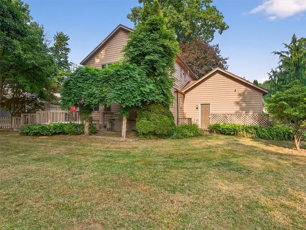 Large Backyard Has A Mix Of Sun & Shade