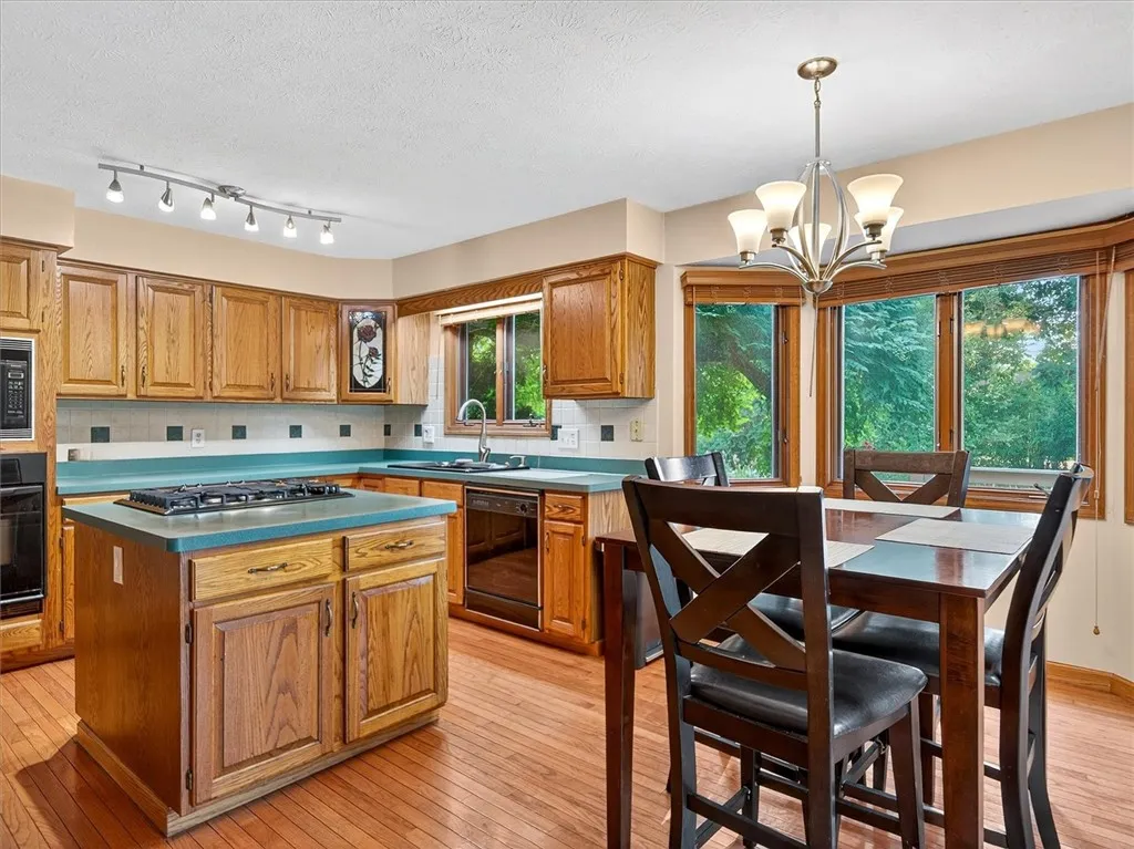 Kitchen Has Plenty Of Cupboards & Counter Space, PLUS A Built-In Cutting Board Next To The Sink