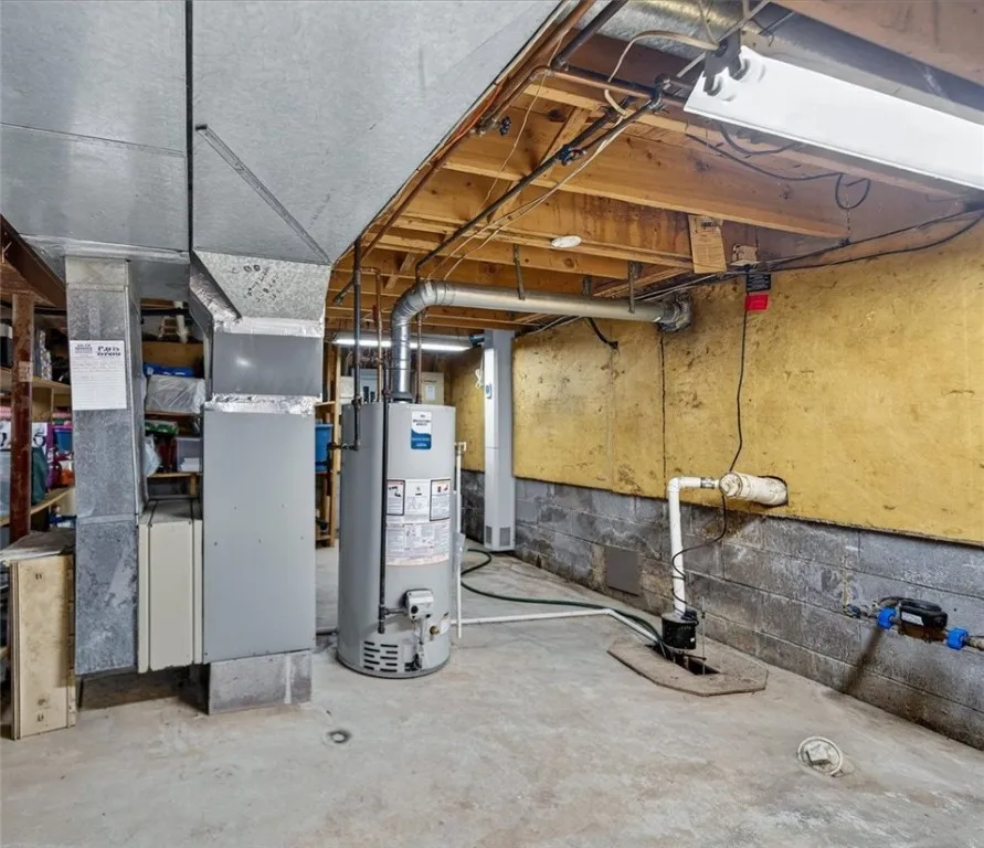 Clean & Dry Basement w/ Storage & Workshop Areas