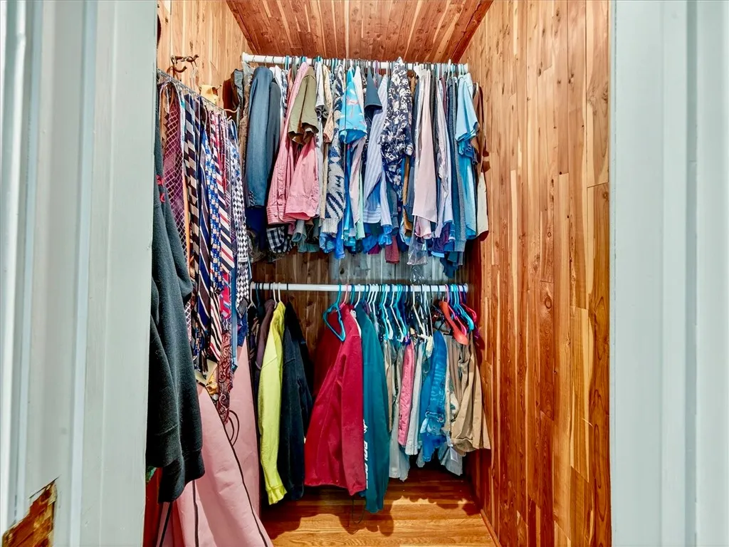 Walk in Cedar closet in hallway. Large walk in unfinished attic space off hallway also