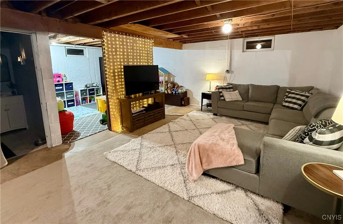 The lower level adds another full bath, family room, office and toy room, as well as laundry area. It adds almost another 1100 SF to the living space!!!