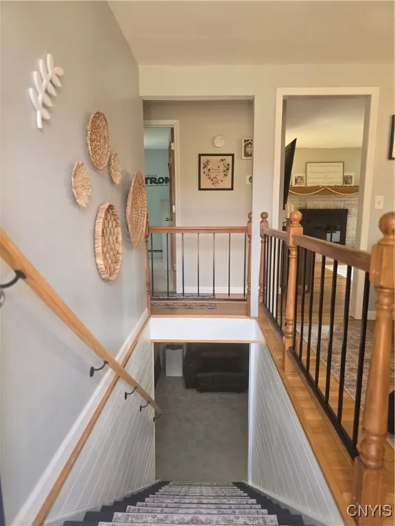 Opening up this wall and stairs has given such character to this home, added light and helped make the lower level part of this home. The shiplap which was done recently, brings it to another whole dimension.