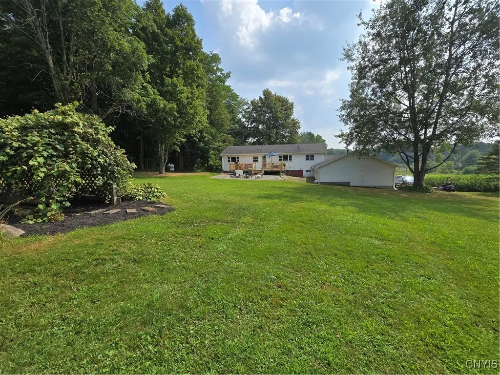 Everything is so lush and green--just beautiful. to the right is a grapevine archway.
