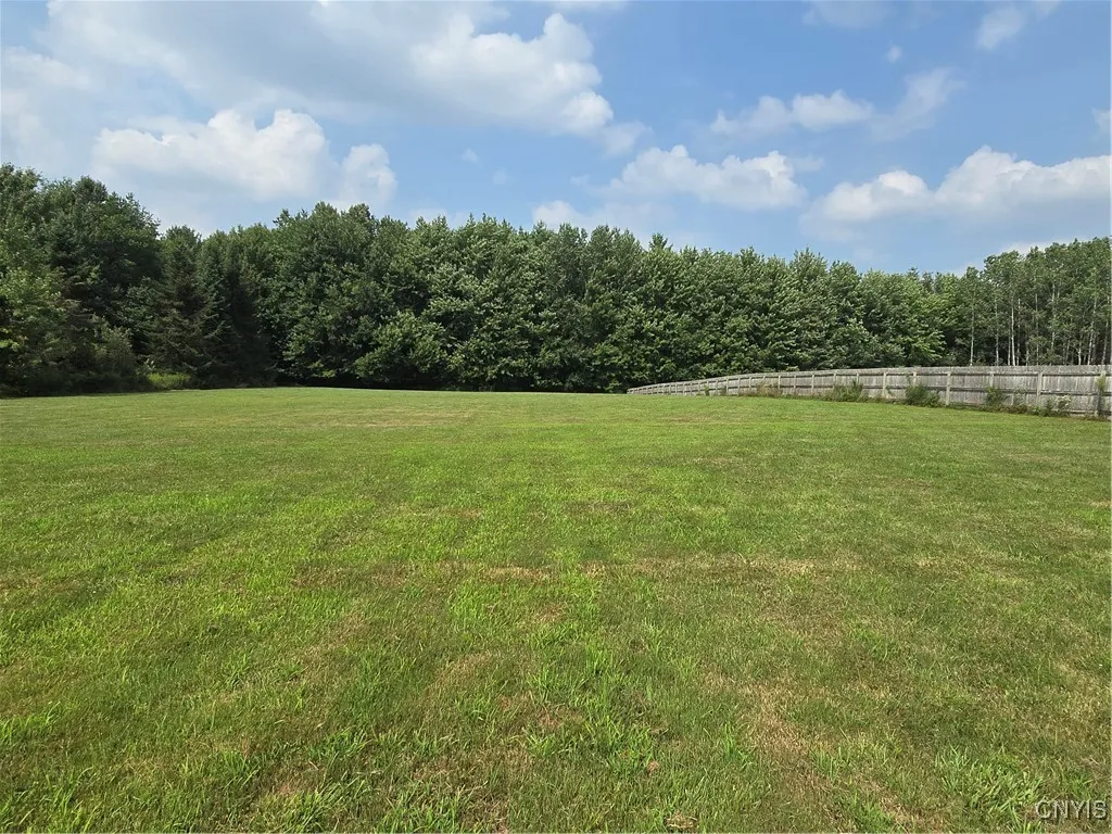 Wow!!! the land goes on forever!!!! I can see why a tractor is needed for mowing!! **It is negotiable**