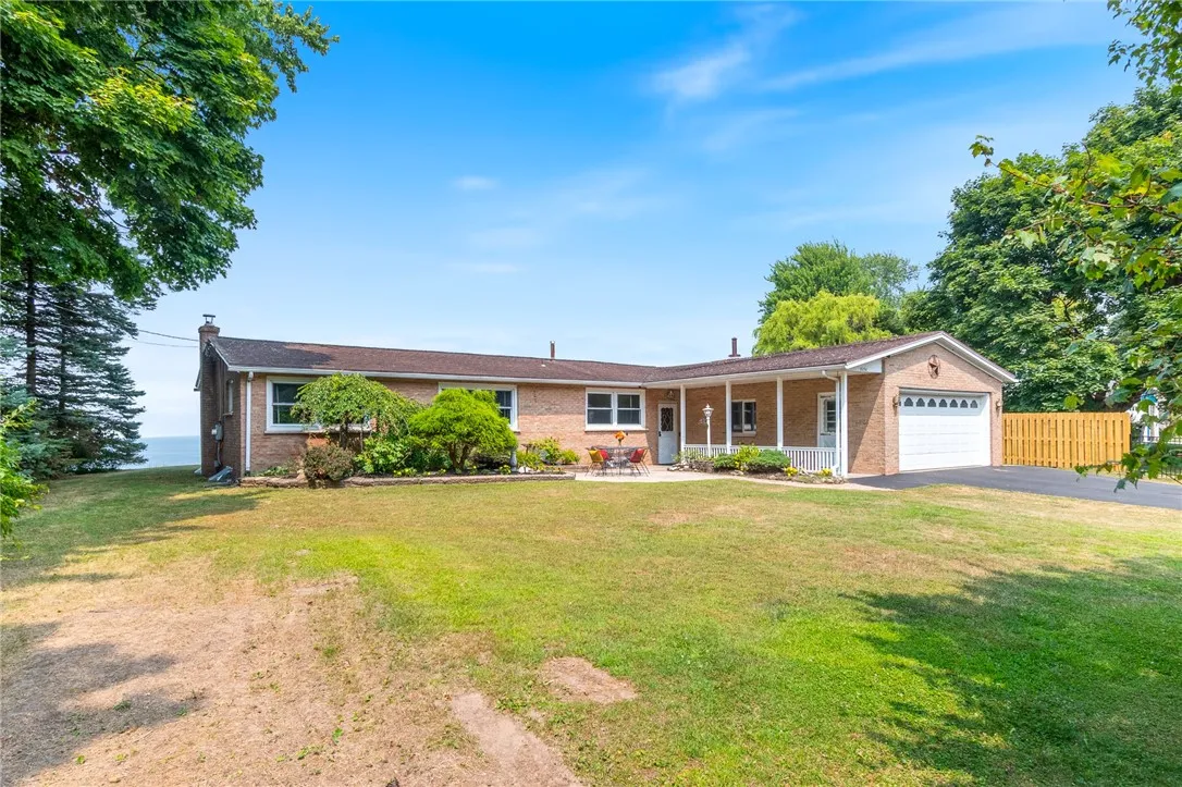 This RANCH STYLE HOME SITS WAY BACK from the road and yet STILL HAS A DEEP YARD that’s on the waterfront