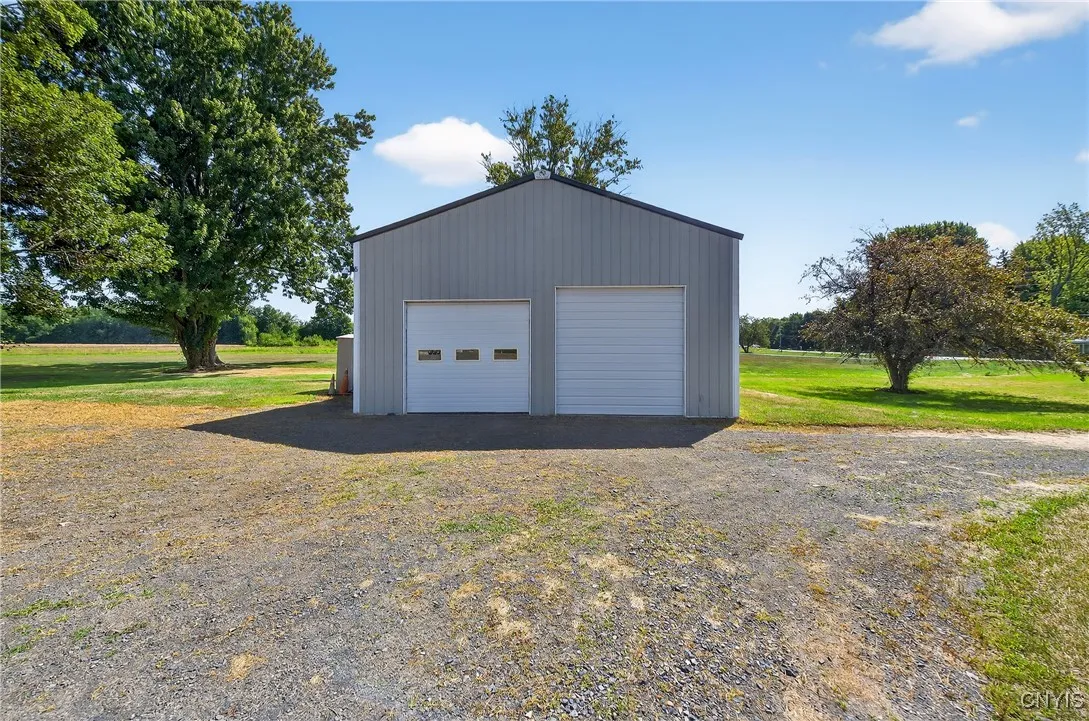 32x44 Pole Barn comes with a 2 post lift and air compressor