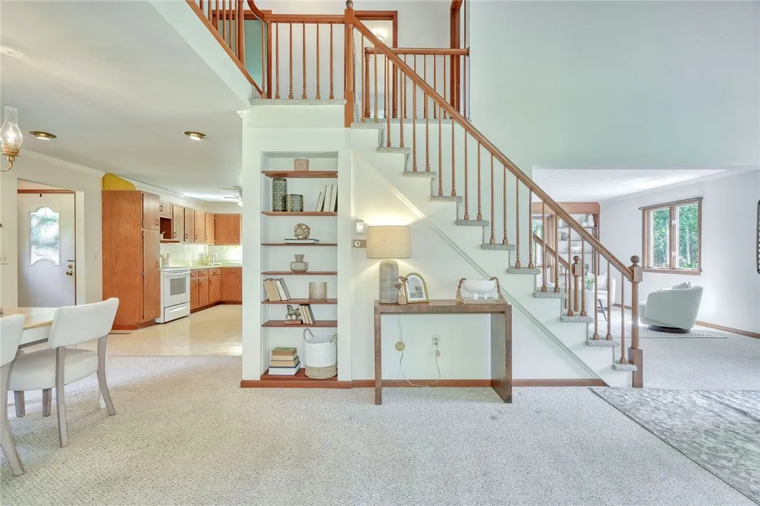 Open & Airy family Room with Vaulted wood-paneled ceilings!