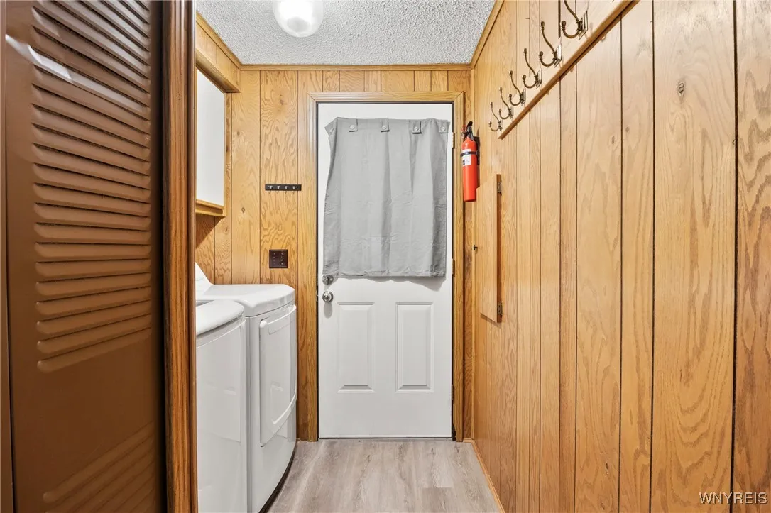Laundry Area Leading out to the Attached Garage