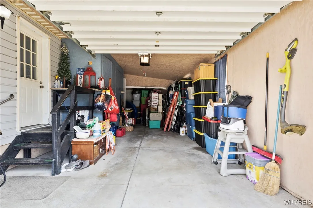 Attached Garage with Custom-Built Storage Area