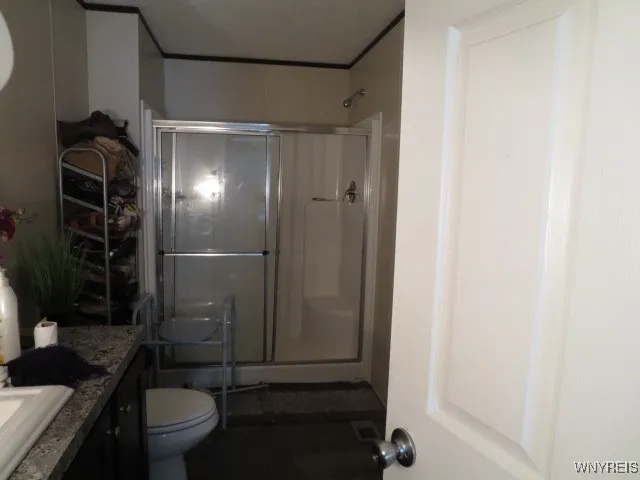 Walk in shower, large vanity & linen closet  in your private bathroom....