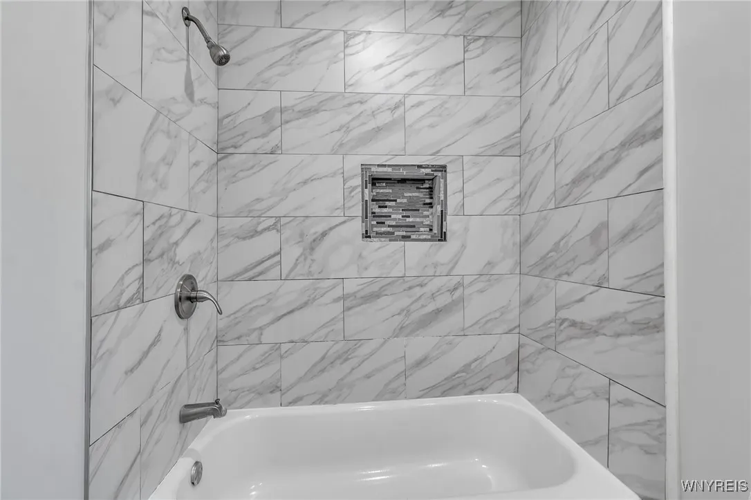 2nd floor tub & tiled shower surround