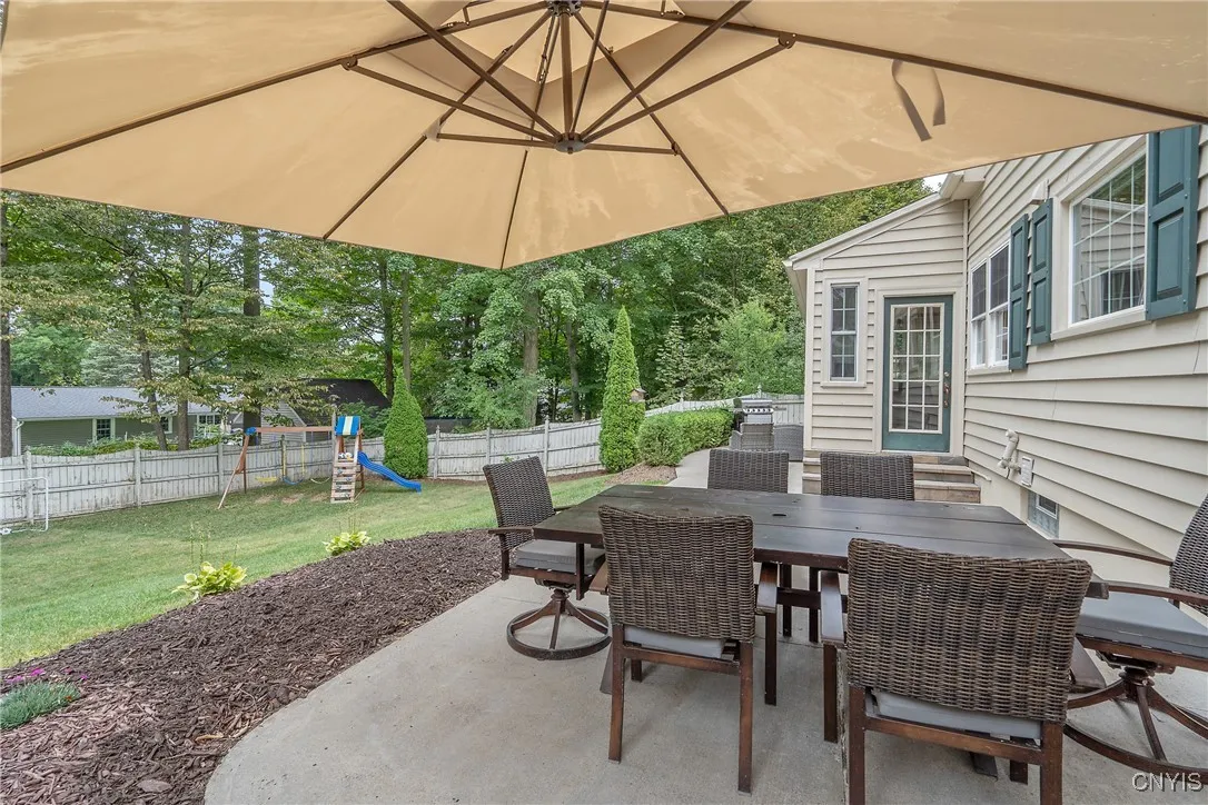 1 of 2 Patio areas in the back yard