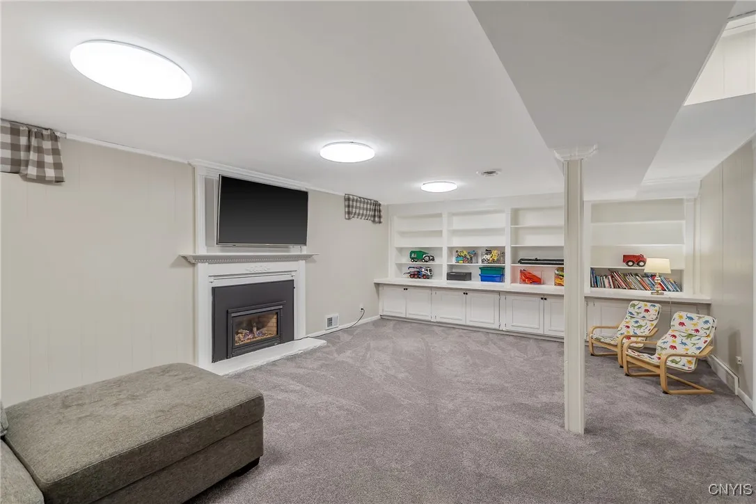 Basement Family Room with Gas Fireplace and amazing built-ins