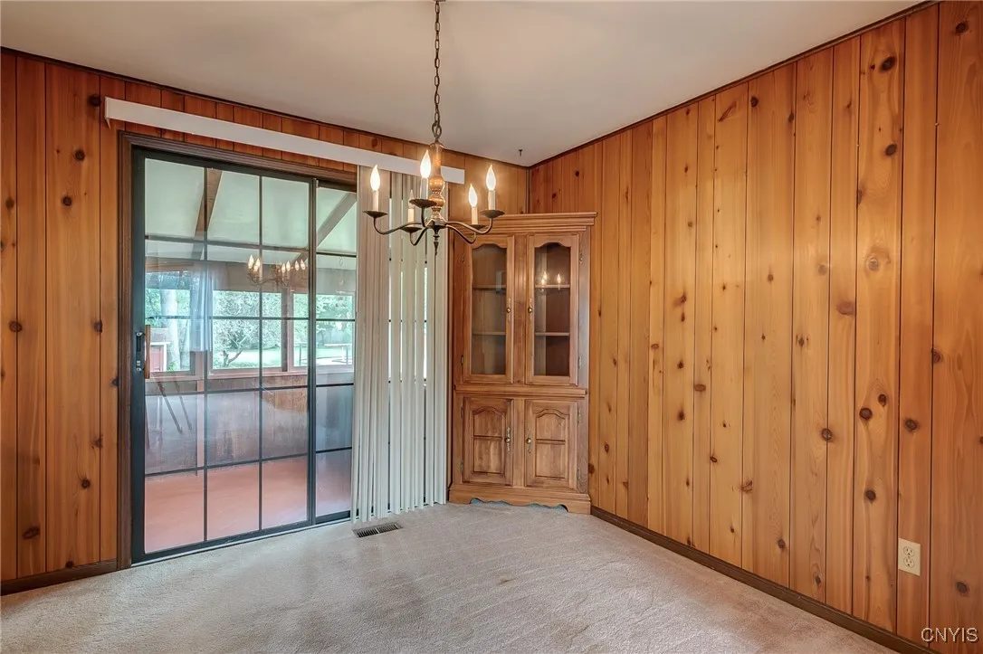 Formal Dining Room leads to the 3 season room