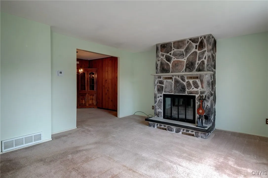 Living Room with Wood Burning Fireplace