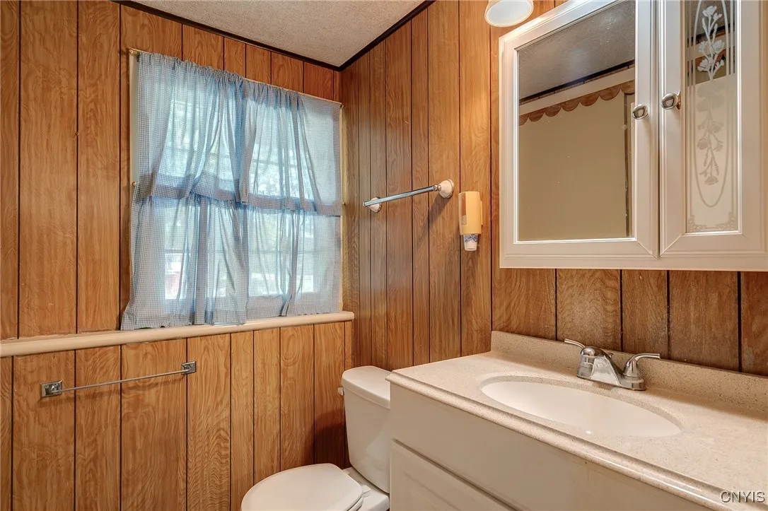 1/2 Bath off the Garage