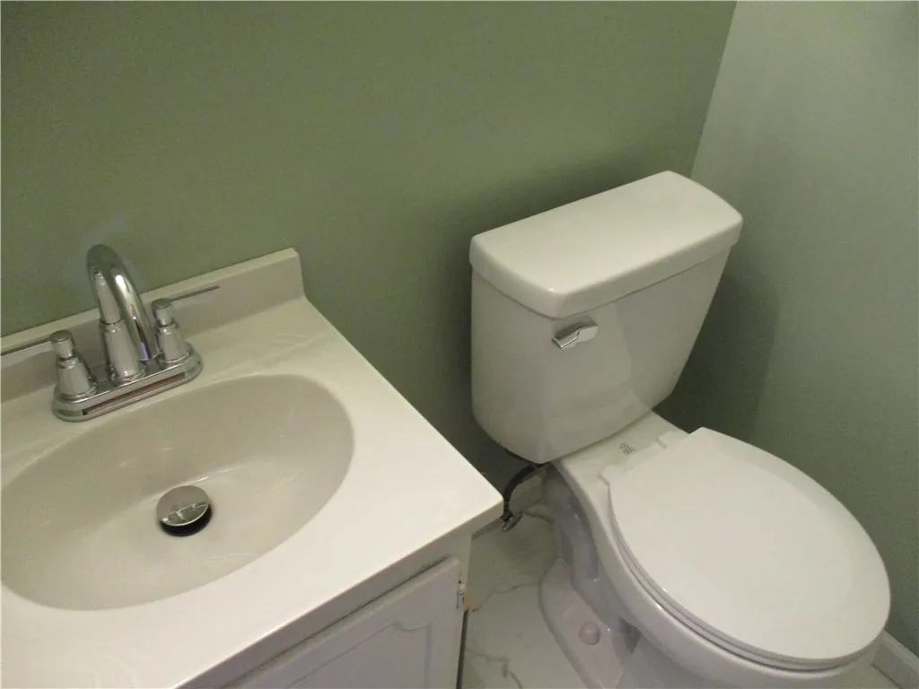 Powder rm down w/new fixtures