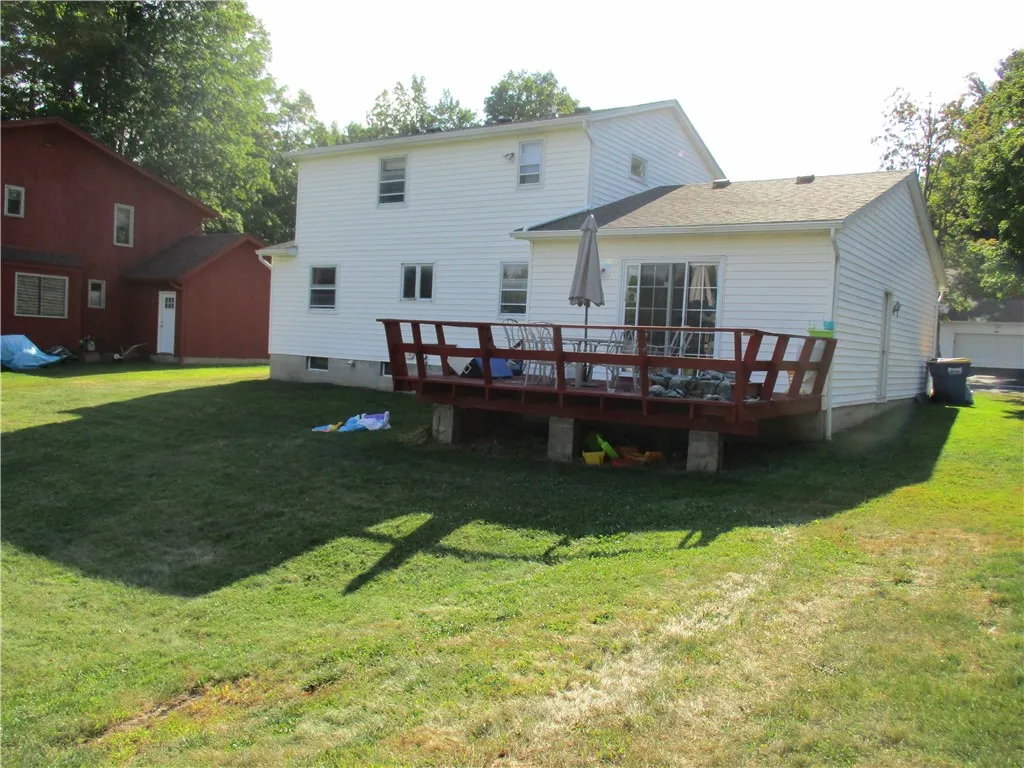 Rear elevation w/deck off family rm