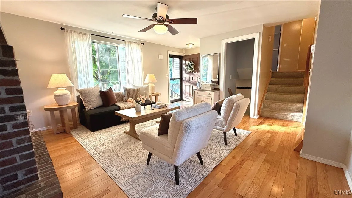 From the living room looking towards the upper staircase